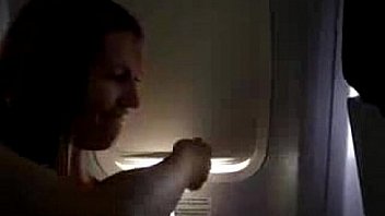 Girl masturbates on a plane